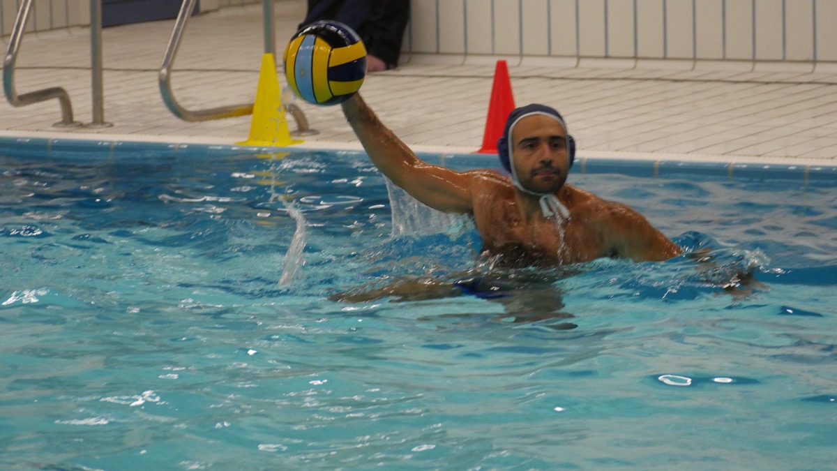 Player throwing the ball with focus and determination